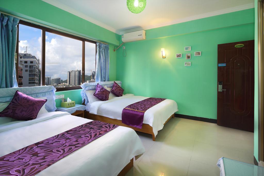 Hantang Holiday House Apartamento Sanya Exterior foto