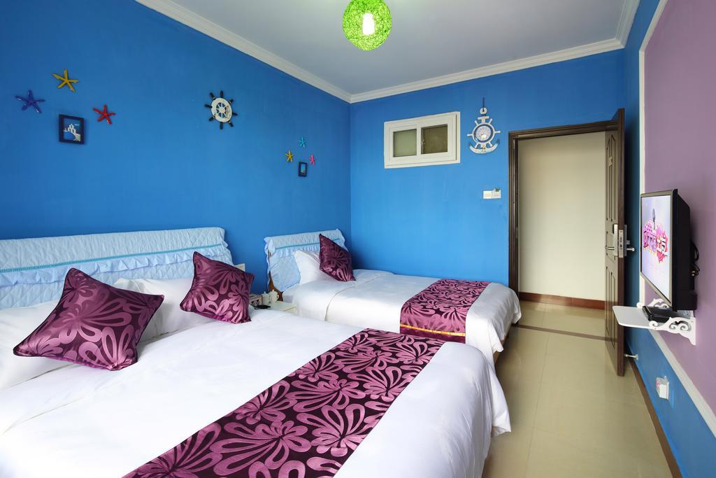 Hantang Holiday House Apartamento Sanya Exterior foto