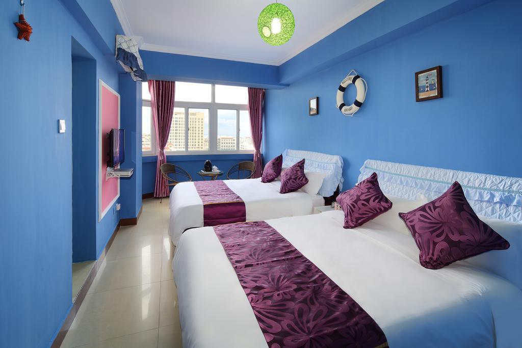Hantang Holiday House Apartamento Sanya Exterior foto