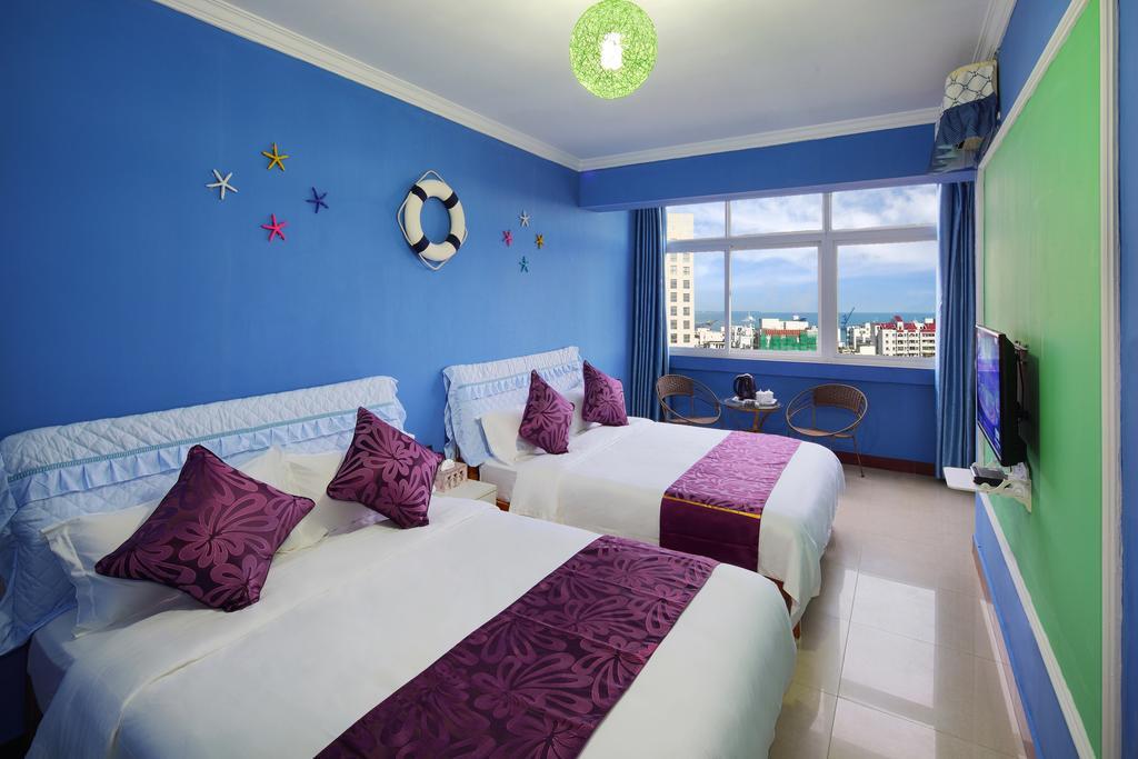 Hantang Holiday House Apartamento Sanya Exterior foto