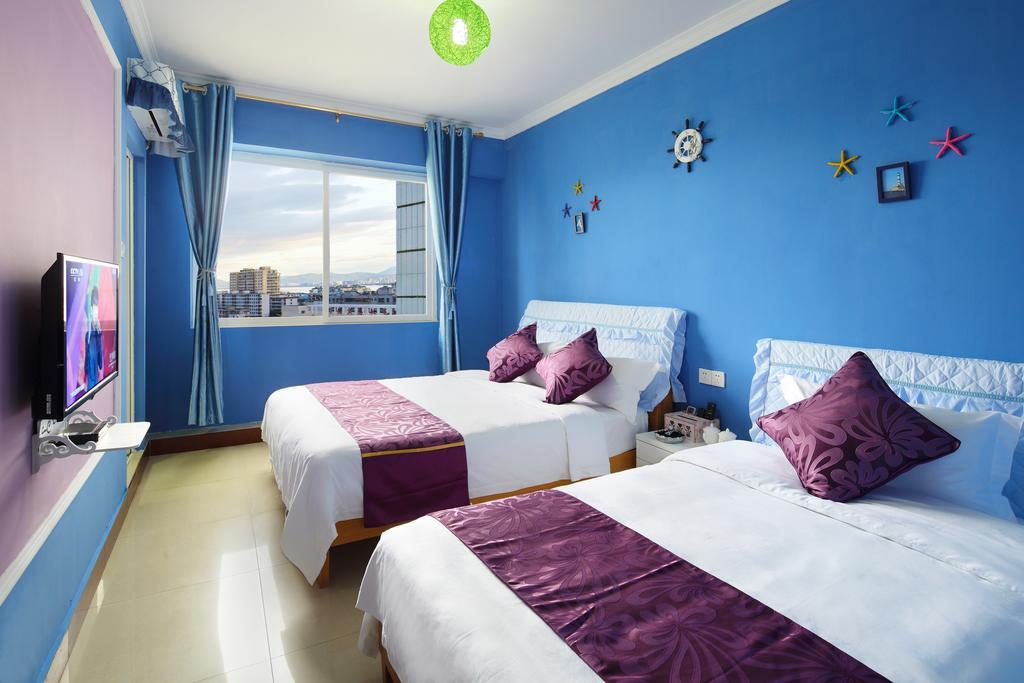 Hantang Holiday House Apartamento Sanya Exterior foto