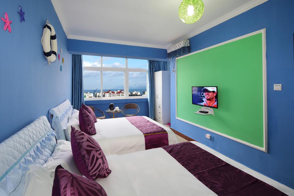 Hantang Holiday House Apartamento Sanya Exterior foto